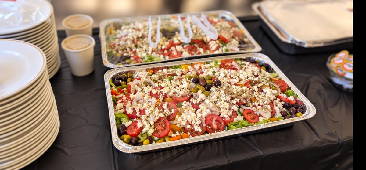 Catering trays of fresh Greek salad