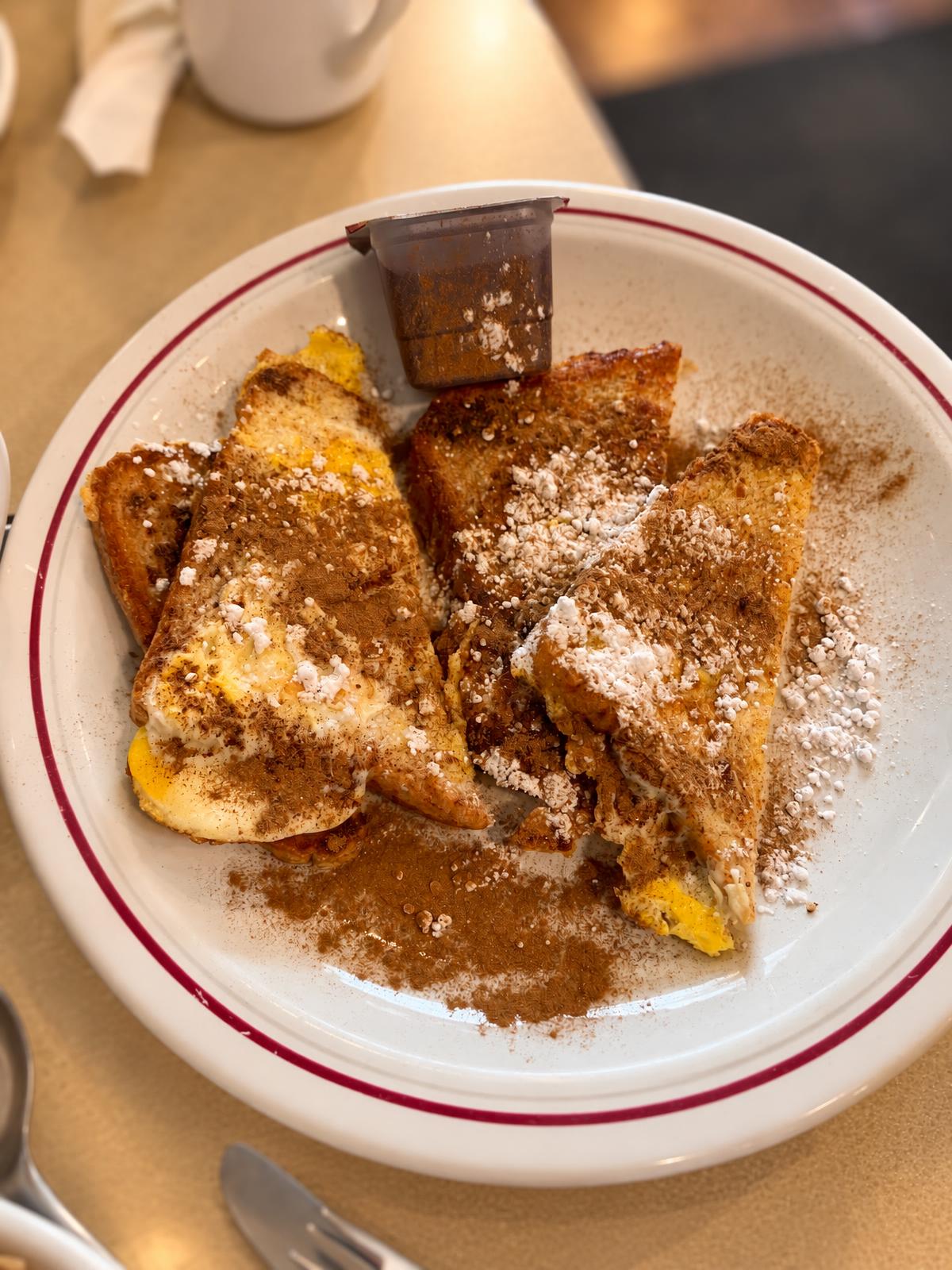 French toast dusted with icing sugar and cinnamon